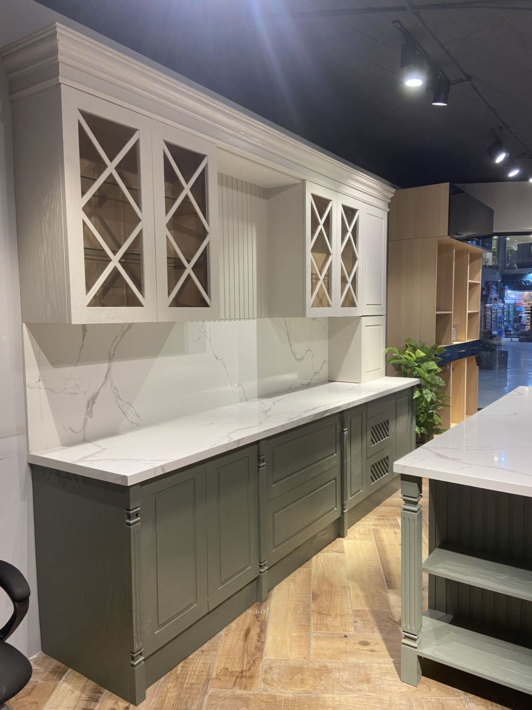 Sage green classic kitchen in our Center Ville showroom